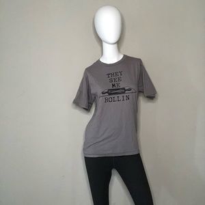 5/$5 ⚡️ NWOT ‘They See Me Rollin’ Baker Tee
